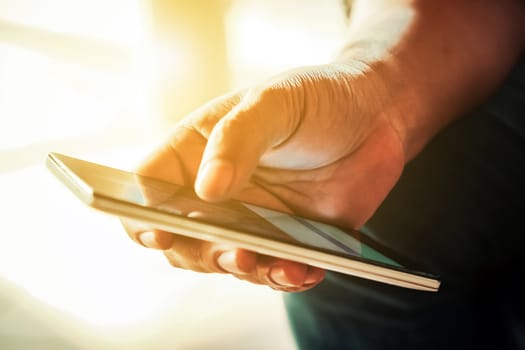close up image of Phone on hands.