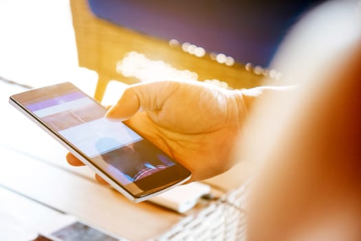 close up image of Phone on hands.