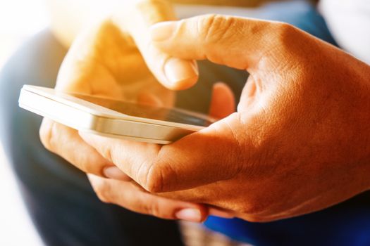 close up image of Phone on hands.