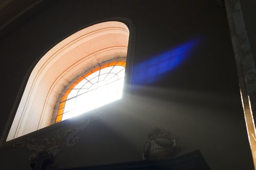 ray  of light trugh an old  church window 