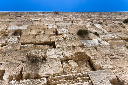 the western wall in jerusalem and blue sky