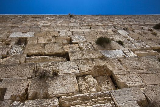 the western wall in jerusalem and blue sky