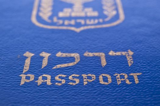  blue israelian passport closeup hebrew writing 