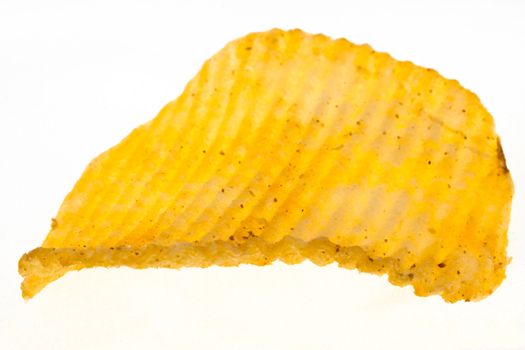 stipped and spiced golden chip on white background