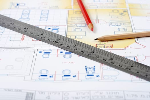 drawing a house plan with pencil and ruler