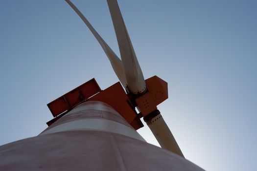 electric power generating wind turbine in the summer