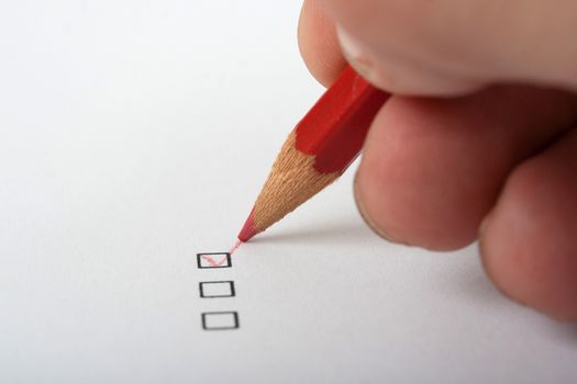 black checkbox  white page and red pencil