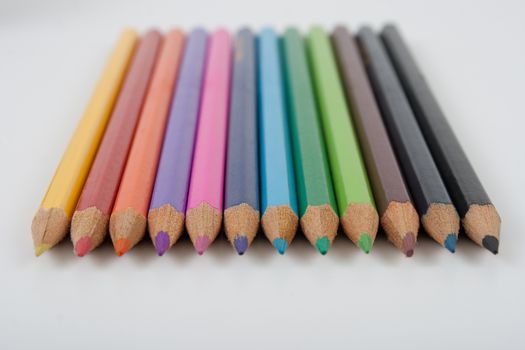 colored pencils front wiev on white background