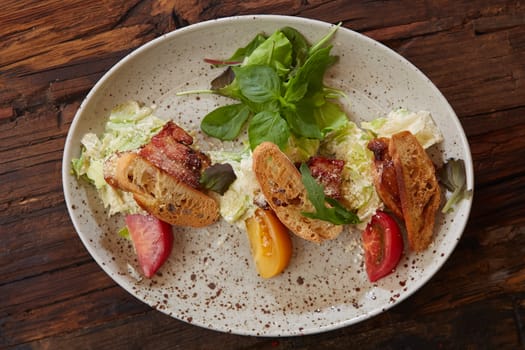 Fresh healthy Classic Caesar salad on plate.