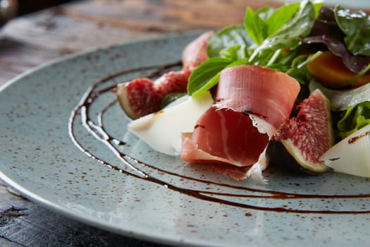 Italian salad. From figs with jamon and parmesan