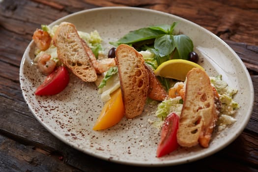 Fresh healthy Classic Caesar salad on plate.