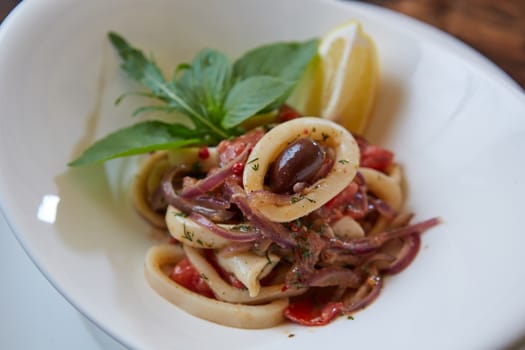 Seafood Salad with Shrimps and Squid Rings. Shallow dof