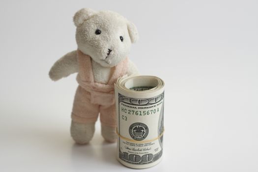 money and a teddy bear the key to a happy childhood