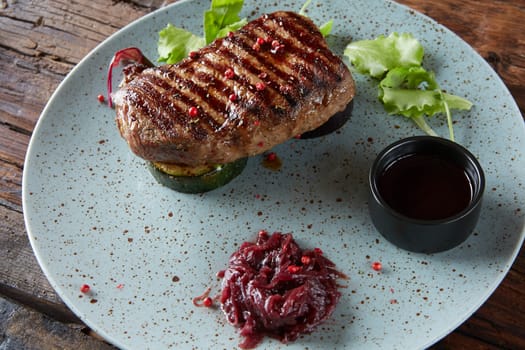 The beef steak on plate. Shallow dof