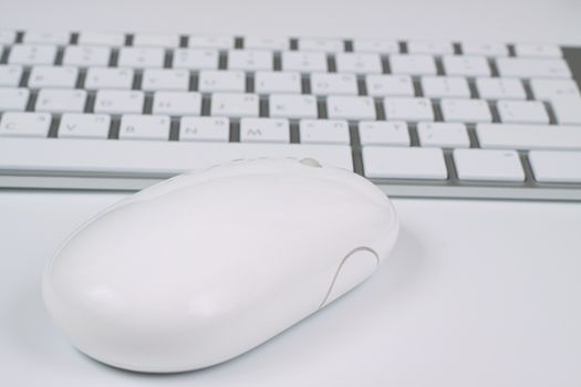 white keyboard and mouse