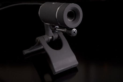 modern webcam on black background