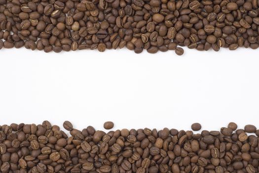 white empty space betwen two rounds of coffee beans