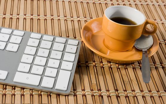 keyboard and a coffee 