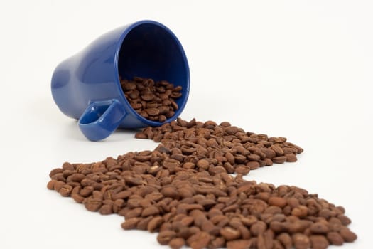 trale made of coffee beans to the blue mug