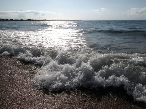 morning sea with dancing wave splashes                          