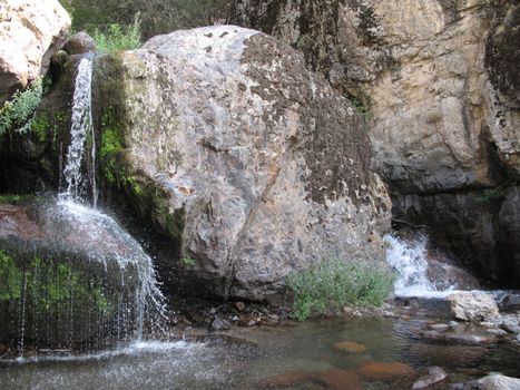 two water flow falls between the big stone