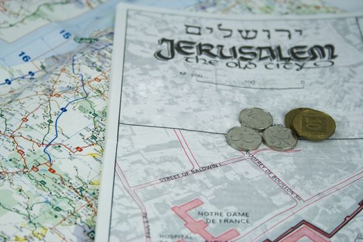 jerusalem map and some coins 