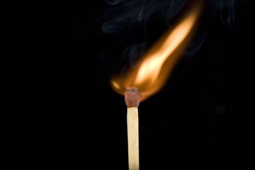 burning match with side flame