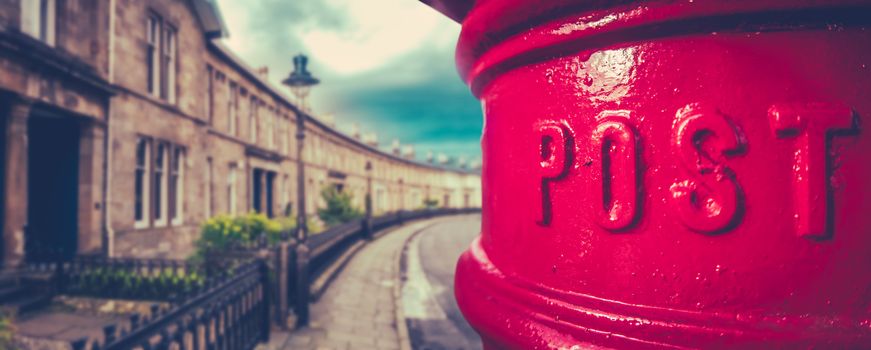 Panorama Of A Traditional British Red Post Box In A Curved Edwardian Terrace Street With Shallow Depth Of Focus