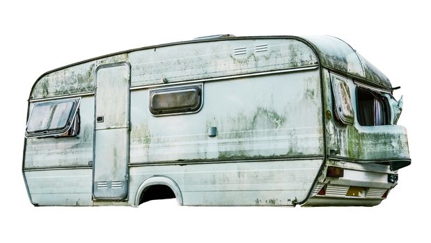 Isolated Disgusting Old Dirty White Caravan With Missing Wheels On A White Background