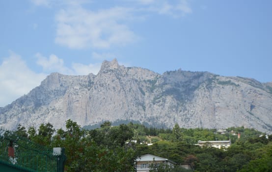 View of AI-Petri mountain in the Crimea, the resort village Miskhor at the foot of the mountain.