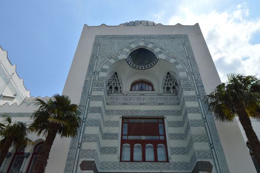 Authentic old beautiful house in Arabic style with carved stone facade.