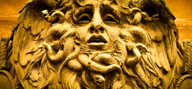 Italy, Turin. This city is famous to be a corner of two global magician triangles. This is a Medusa's head made of bronze close to the historical garden of Valentino in Turin.