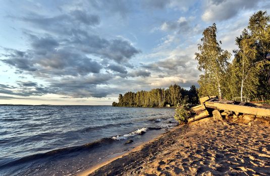 colorful evening cloudy sky over the lake, South Ural, Uvildy