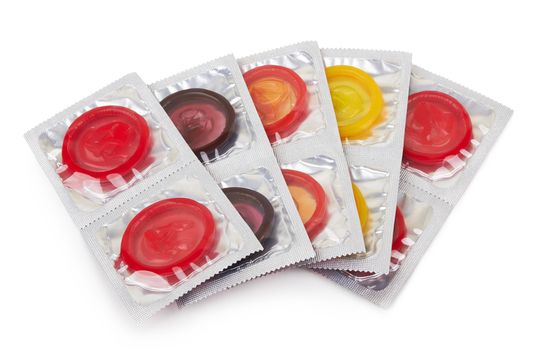 Colorful condoms isolated on white background