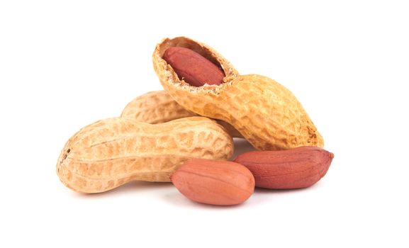 Fresh peanuts with shells isolated on white background