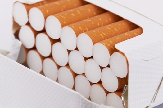 Closeup of a pile of cigarettes in pack