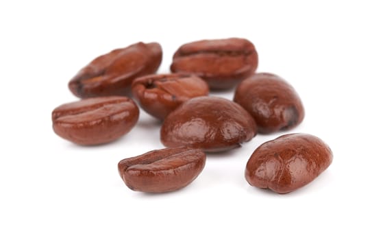 Brown coffee beans on a white background 