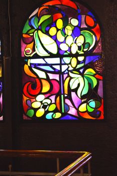 Vintage stained glass Windows with colorful patterns.