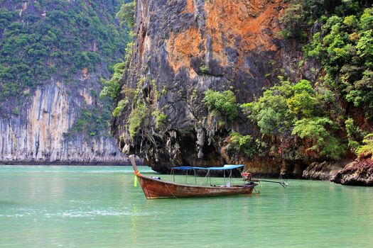 Thai traditional wooden longtail boat and beautiful ocean