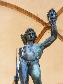 the bronze statue of Perseus holding the severed head of Medusa made by Benvenuto Cellini in Florence, Italy