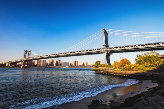 Manhattan Bridge in New York with Downtown