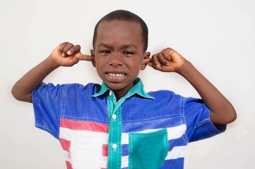 This little boy wants to hear nothing that was said about him.