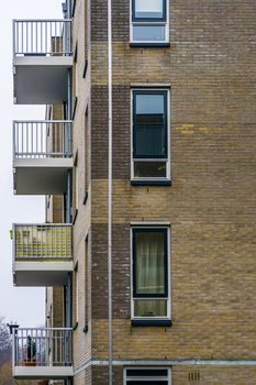 Modern dutch city architecture, apartments complex with balcony's and windows