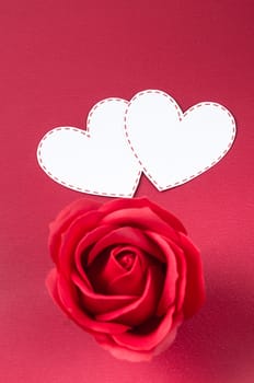 Blank card heart shape with red rose on red background, Valentine concept.
