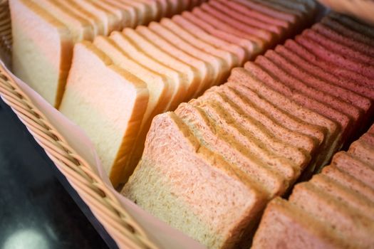 row of sliced bread in basket