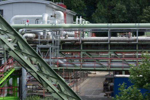 View of pipelines and towers of the oil and gas refinery.