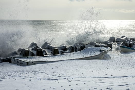 A snow boat at the coast of Shiretoko near Rausu in winter at Hokkaido of Japan.