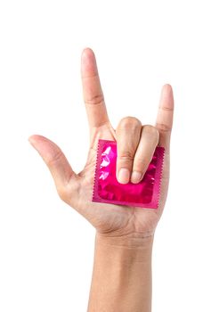 Pink condom in pack on hand showing love symbol isolated on white background, Save clipping path.