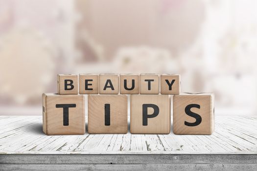 Beauty tips sign on a makeup table in a bright powder room with a pink tone