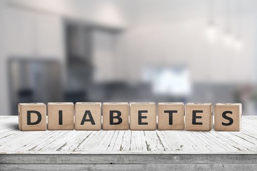 Diabetes disease sign on a table in a bright kitchen in daylight